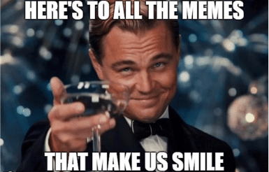 Business man holds a glass looking towards the viewer, meme text reads: HERE'S TO ALL THE MEMES THAT MAKE US SMILE